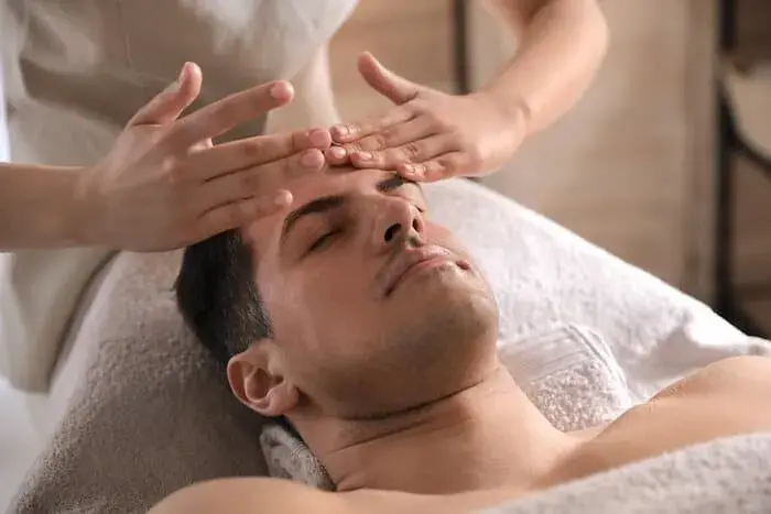 Man-receiving-facial