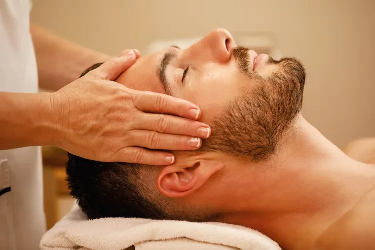 closeup-man-getting-head-massage-relaxing-with-eyes-closed-spa_637285-1721_11zon